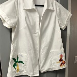 White short sleeve open front shirt with Green,Red, Blue and Yellow Embroidery